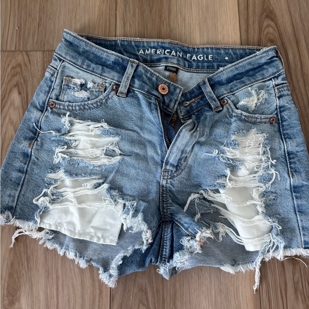 American Eagle Outfitters Ripped Light Blue Jean Shorts